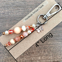 Copper Butterfly Beaded Charm
Delicate butterfly charm with premium gemstone beads and rustic copper findings, clipped to a handbag or luggage.