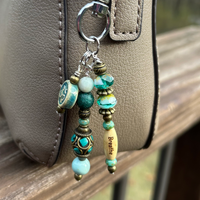 Mindfulness charm with for purse decoration shown on purse with Breath word bead, handmade with high-quality Czech and gemstone beads.